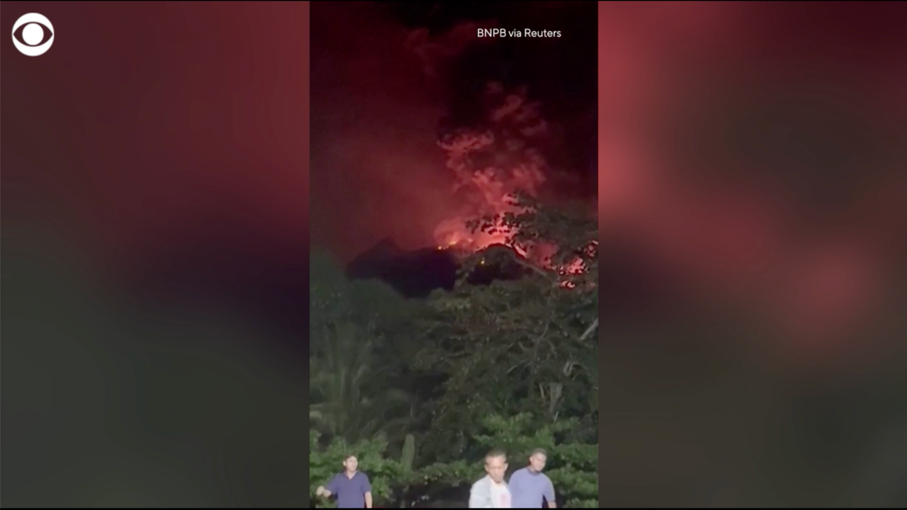 Days-long eruption of Indonesia's Ruang volcano forces hundreds to evacuate as sky fills with red ash