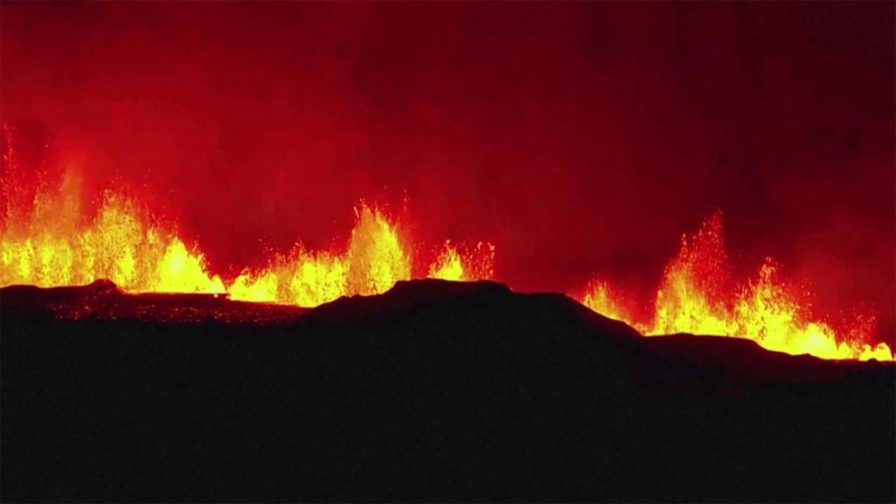 Iceland's volcano eruption cuts off hot water supply to thousands after shooting lava 260 feet in the air