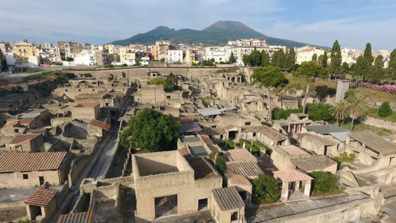 Words on mysterious scroll buried by Mount Vesuvius eruption deciphered for first time after 2,000 years